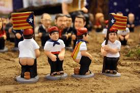 http://nightflight.com/more-crap-for-christmas-the-catalan-tradition-of-the-crapping-caganer-in-the-santa-hat/