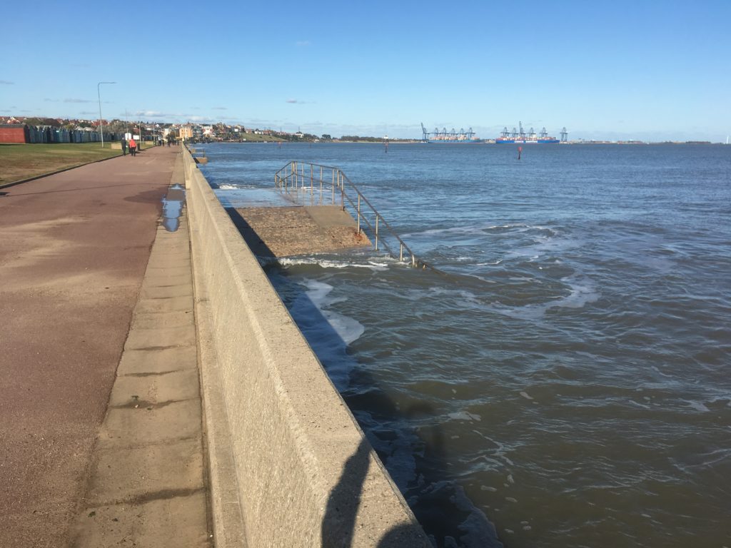 Walking beside the beach (?) looking over to Harwich Port