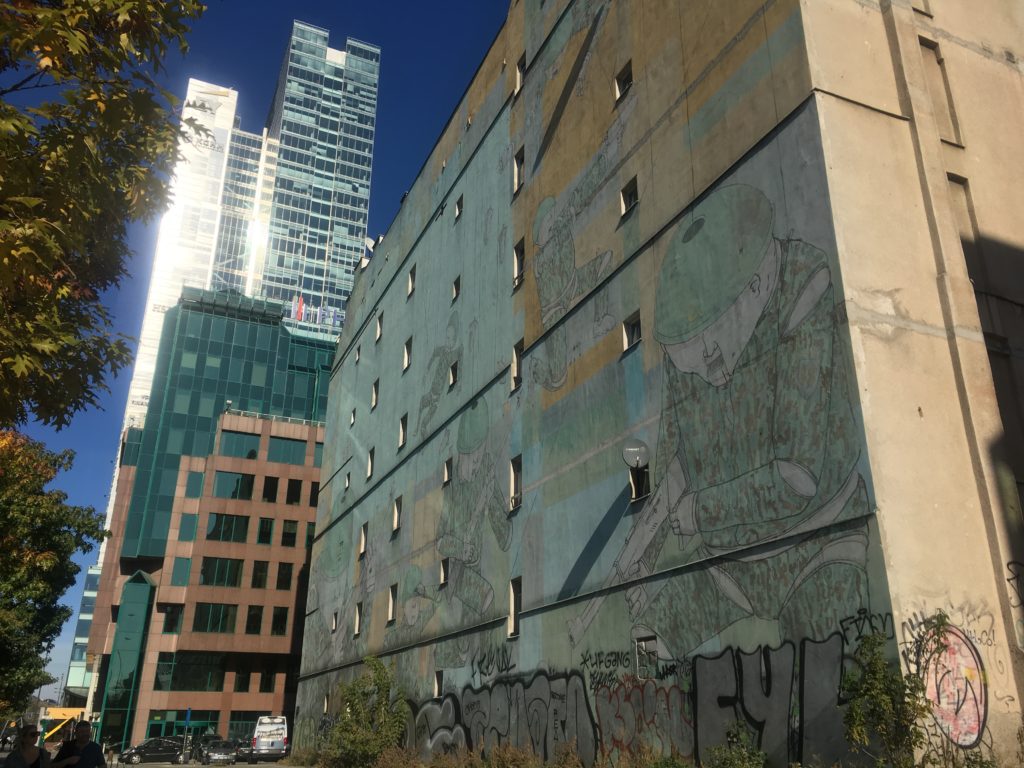Warsaws growth flanks memorial mural