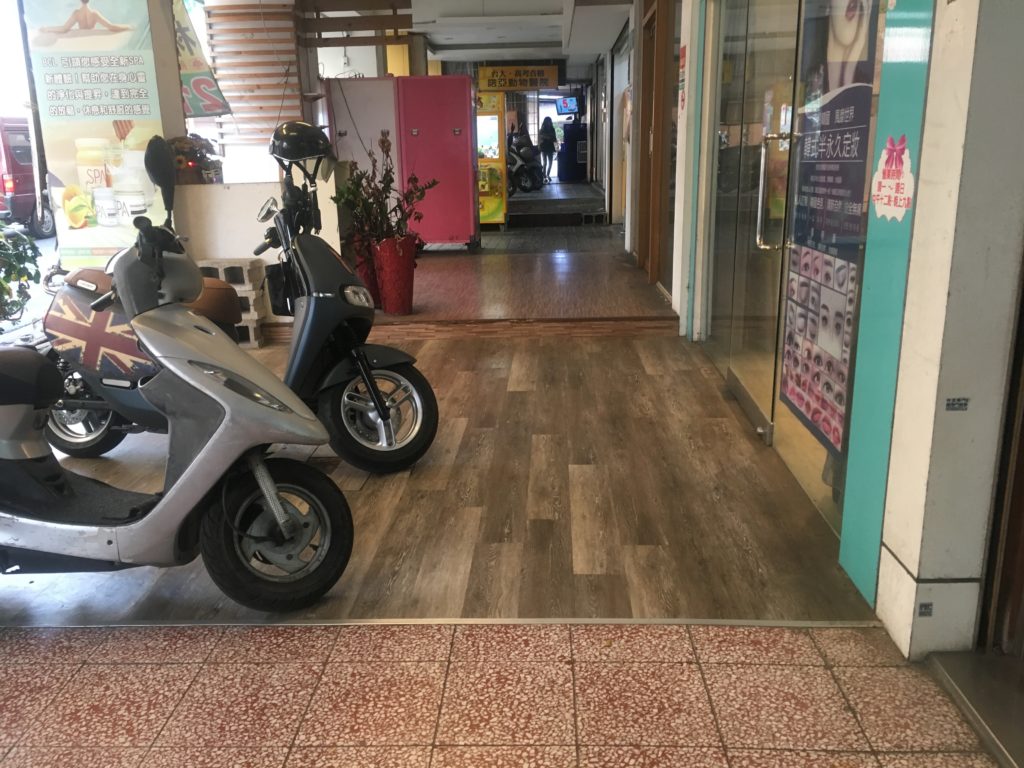 Tainan footpath showing different levels of each shopfront