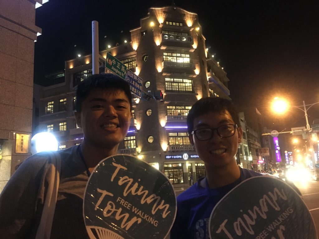 Tainan tour guides Michael and Tom with Hayashi Department Store backdrop
